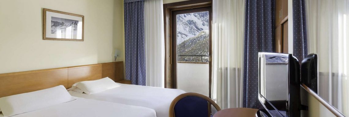 Club Med Cervinia, en Italie - Chambre au teinte pastelle 